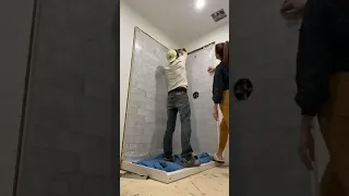 Husband and wife tackle utile shower by maxx. It’s as easy as it looks!!!