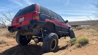 Zj grand Cherokee on 38s and rough country long arms Slideshow
