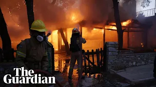 Greece: Wildfires reach outskirts of Athens forcing thousands of residents to flee