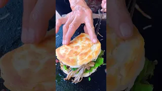 Chinese burger Grilled Enoki Mushrooms on Stone Plate