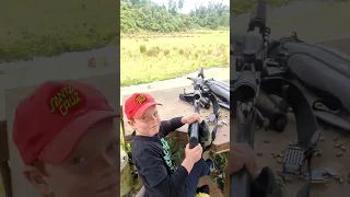 7 year old shooting big guns