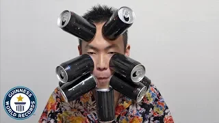 Cans stick to my skin! - Guinness World Records