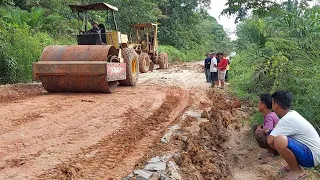 perbaikan jalan pake motor grader sertika bumi dan beko