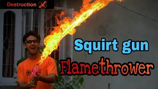 How to make a FLAMETHROWER at home using squirt gun .