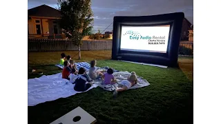 How to set up a backyard movie.  DIY outdoor movie in the driveway or the yard, with rear projection