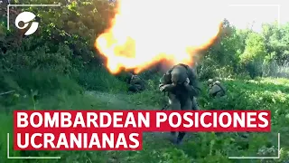 Russian riflemen blitz Ukrainian positions with tanks and rocket launchers