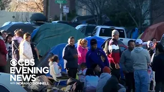 Denver motel owner helps feed, house migrants