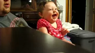 Baby laughing at mom sneezing