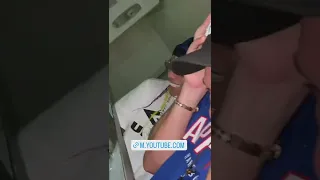 6ix9ine throws money out the balcony