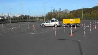 Въезд в бокс задним ходом с прицепом