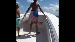 Guy Double Jumps on a Boat