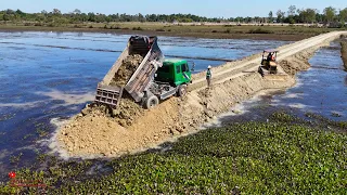 Fantastic New Project Road Water Technical Expert Dump Truck Unloading Rock Soil In Water Cross Lake