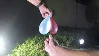 water balloon explode in slow mo