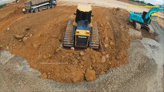 Heavy Machinery Work Bulldozer Excavator Dump Truck Pour soil to remove mud in the pit