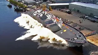 New US Navy warship launches into river