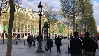 Arc de Triomphe  and Champs Elysees Avenue in Paris, France. April 2019