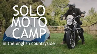 Solo Motorcycle Camping on a Triumph Bonneville T120, in the English countryside during summer.