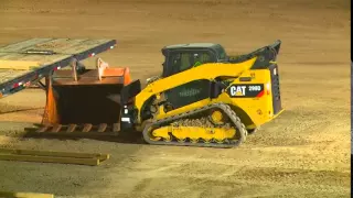 John Deere 333E track loader vs Competition 5500 LB lift