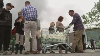 Farmers drain supermarket shelves in milk price protest