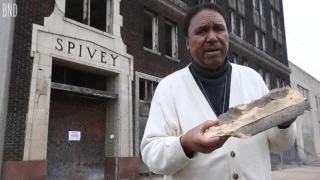 Spivey building in East St. Louis crumbling, bricks falling to sidewalk