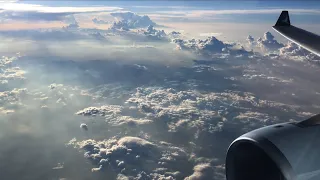 Relaxing Cruise Flight through amazing Cloud Formations into the Sunset in Cathay Pacific's A330