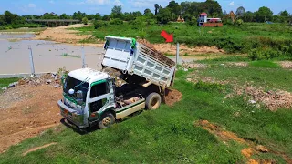 Start a new project, Fill in the soil in the lot, KOMATSU D20 bulldozer & 5T dump truck Unloading