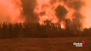 Fort McMurray wildfire within metres of Highway 63