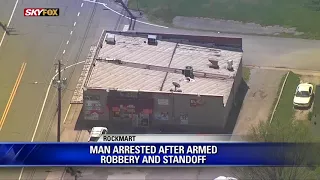 Man arrested after armed robbery and standoff