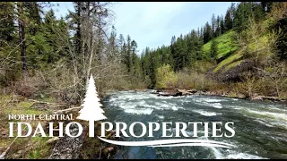 Live off the Land in Idaho! A beautiful river front, log home on 16 acres.