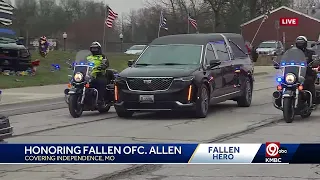 Motorcade escorting Officer Cody Allen to the gravesite makes stop in front of Independence Polic...