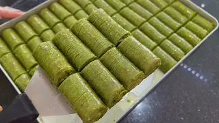 Cooking Turkish baklava green sarma with pistachios. This recipe is 500 years old. Very tasty.