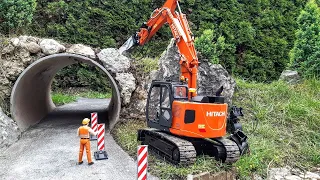Stone wall build above the tunnel Hitachi Zaxis ZX 135 US RC 1:15 Scale