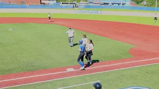 Umpire ejects runner for collision