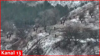 Large group of Russians attacking Bakhmut on snowy roads destroyed in forest