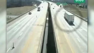 Wind blows semi-truck over, caught on camera