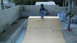 michael on skateboard half pipe 2