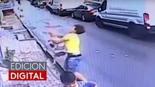 En video: Adolescente atrapa en el aire a una niña de 2 años que cae de un segundo piso