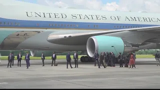Dozens at airport to watch Air Force One land