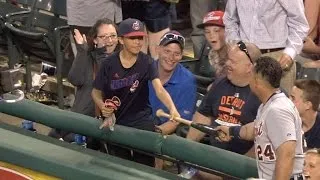 DET@CLE: Young fan on bat, gloves he got from Miggy