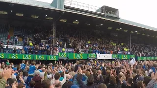 Portsmouth team celebrate winning the League Two title with their fans on the pitch.