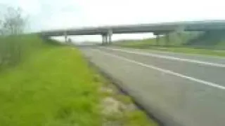 Ferrari on highway blow away policeman.3gp