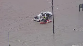 City of Dallas employee rescued from fast-moving floodwaters while working at park
