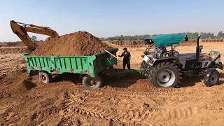 Eicher 557 tractor again stuck with load in the field
