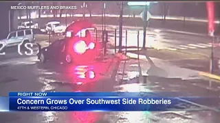 Chicago armed robbery caught on camera outside auto shop