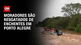 Moradores são resgatados de enchentes em Porto Alegre | AGORA CNN