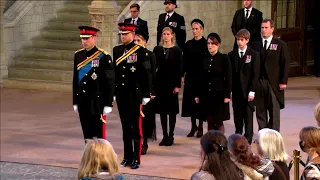 Queen's 8 grandchildren hold silent vigil beside her coffin