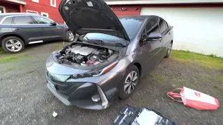 2017 Prius prime installing a NEW 12v BATTERY, Easy to do. Original battery lasted 145,900 miles!