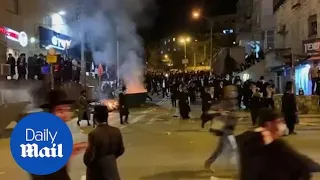 Ultra-Orthodox Jews clash with cops in Israel over COVID lockdowns