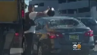 Caught On Video: Wild Road Rage Incident Shows Motorcyclist Smashing Driver's Rear Windshield