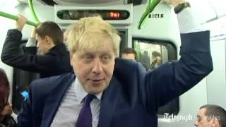 Boris Johnson joins commuters on District Line